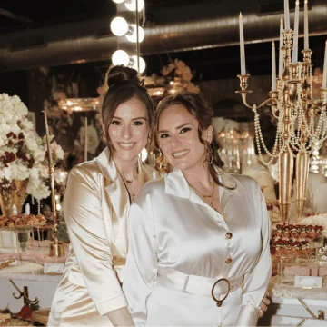 Chef Selena and Mariah together at a candlelit styled spread